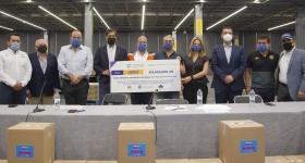 Rector General en la entrega de cheque simbólico al Gobernador de Jalisco
